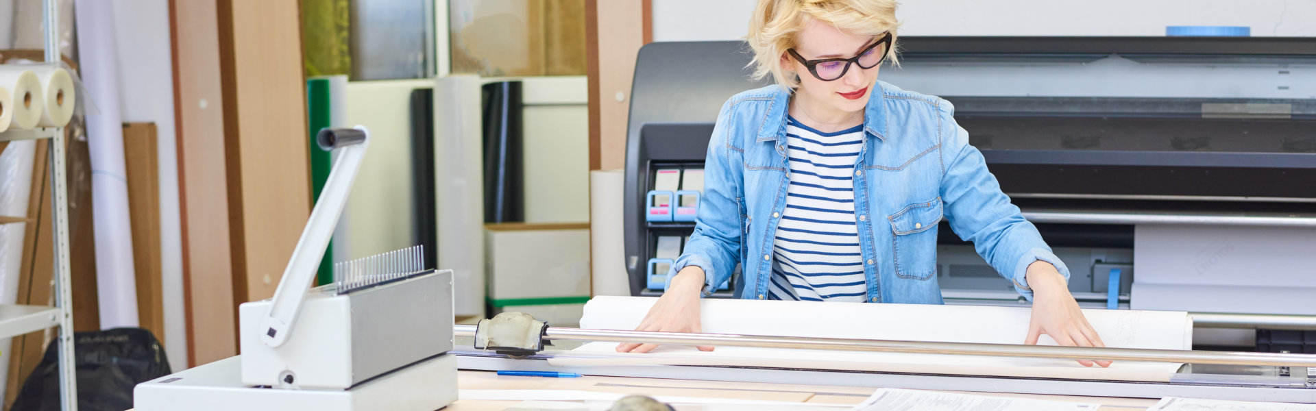 woman checking printing materials